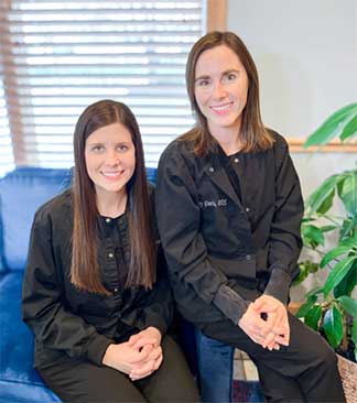 Picture of two staff members.